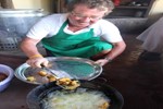 Ton is baking fish; 130 mouths to feed